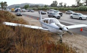Aircraft lands on busy highway